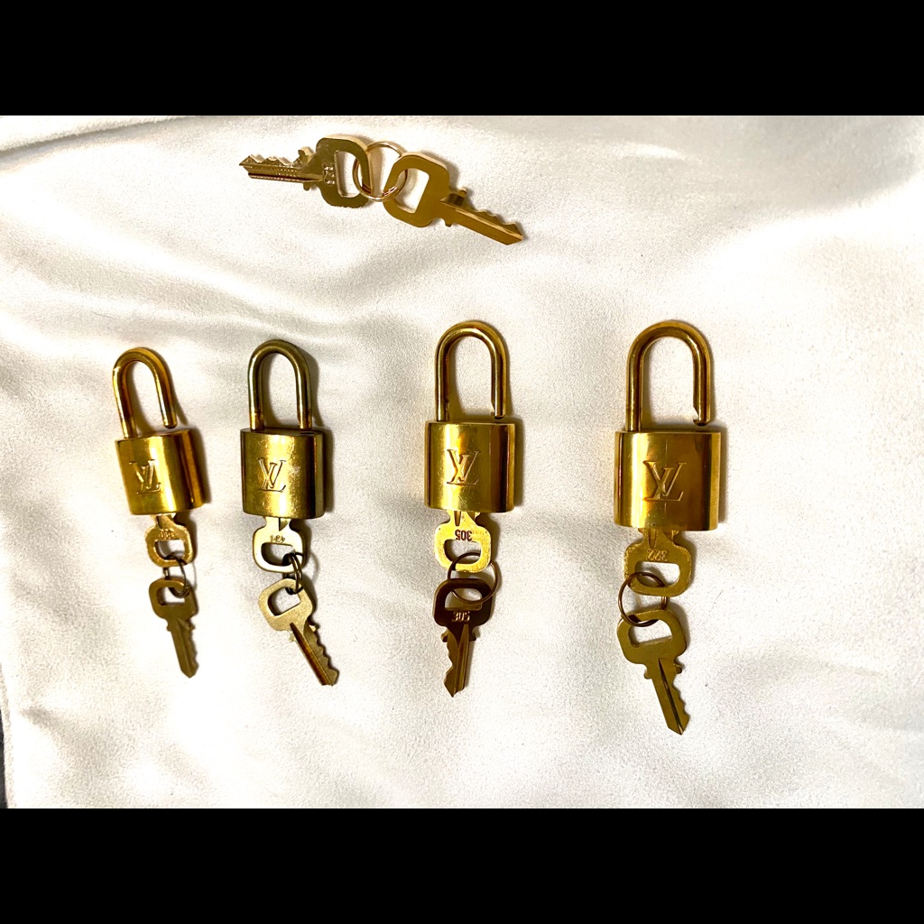 Authentic Louis Vuitton Matching Lock & Key Sets